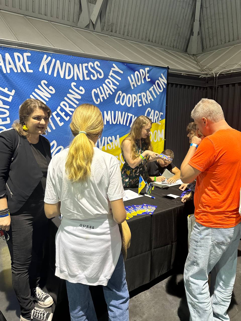 People enjoy a vibrant cultural festival with food stalls and activities.